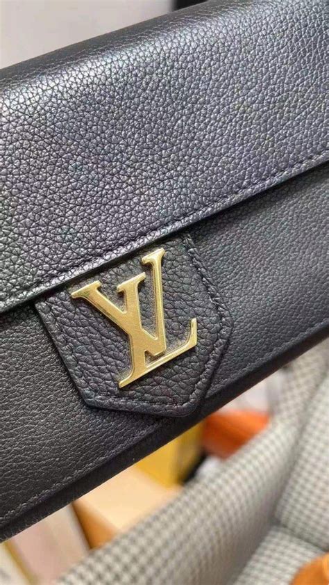 lock me bag louis vuitton|louis vuitton lockme wallet.